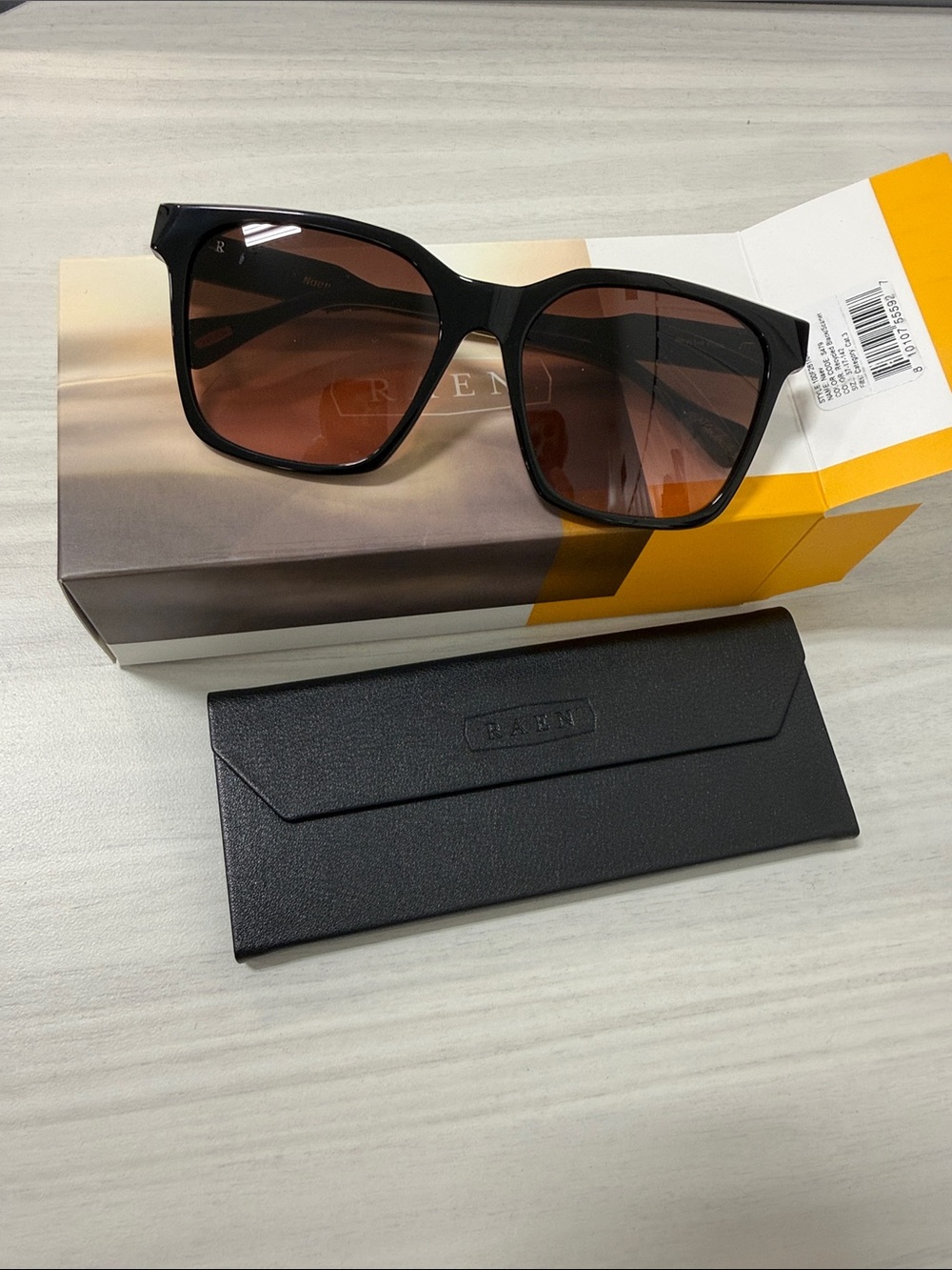 RAEN naev Black Frame Sunglasses with Brown Gradient Lenses